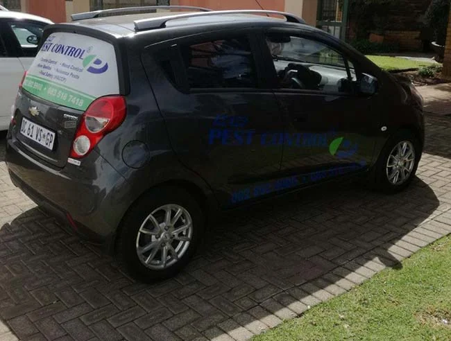 An Izazi Pest Control branded car